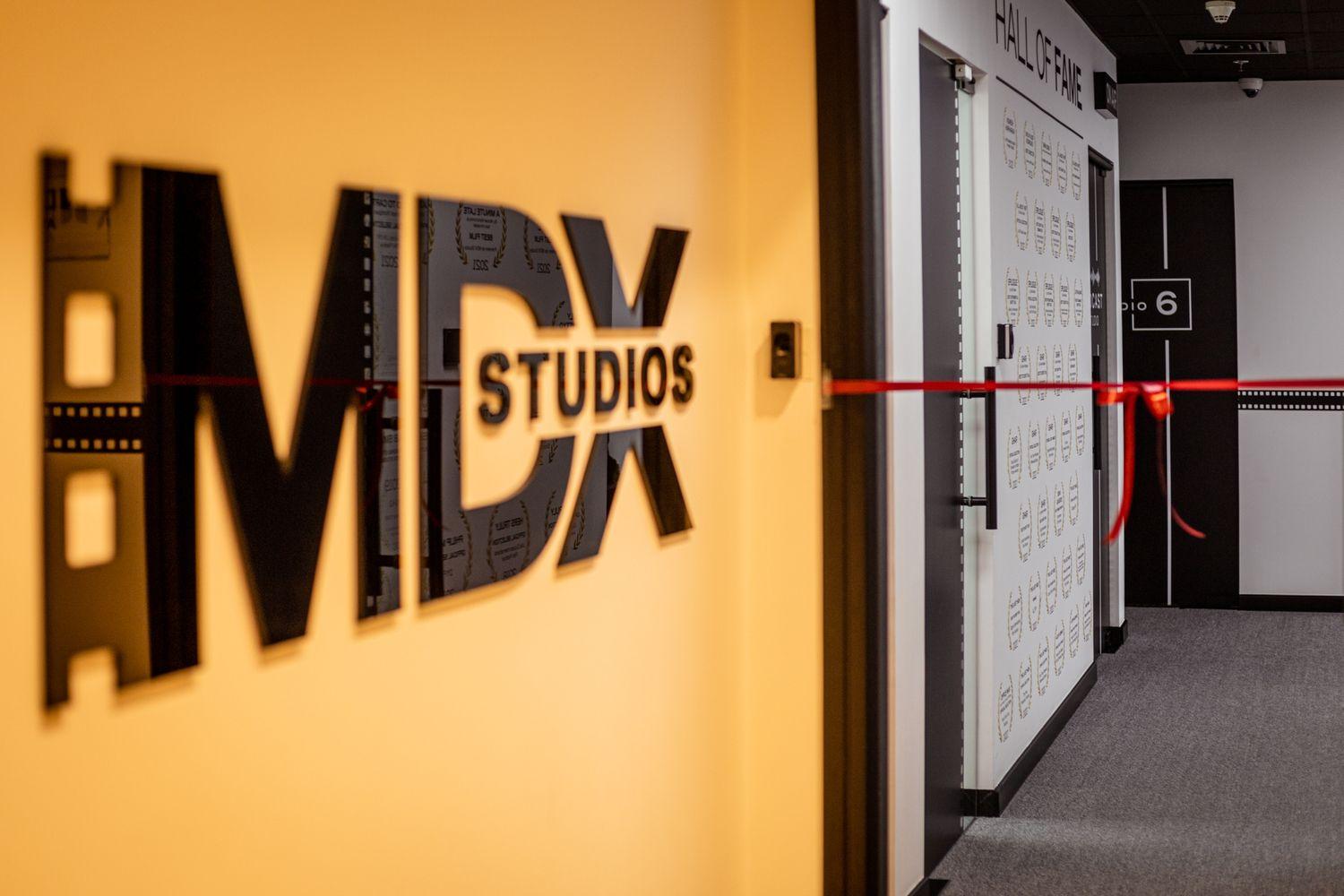 We are delighted to unveil our enhanced, state-of-the-art Film Lab, MDX Studios. Designed to provide an immersive and holistic film education and support the development of the UAE's burgeoning film sector, MDX Studios provides our talented student filmmakers with exclusive access to state-of-the-art equipment, including RED camera kits, a dedicated Podcast Studio, Dolby Atmos Theatre and Mixing Studio, recording studio, and many more facilities as part of the studio setup.